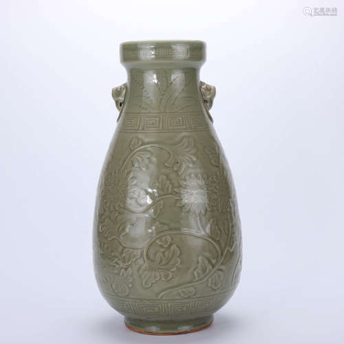 A CHINESE LONGQUAN KILN CYAN GLAZED RELIEFFLORAL PORCELAIN ZUN