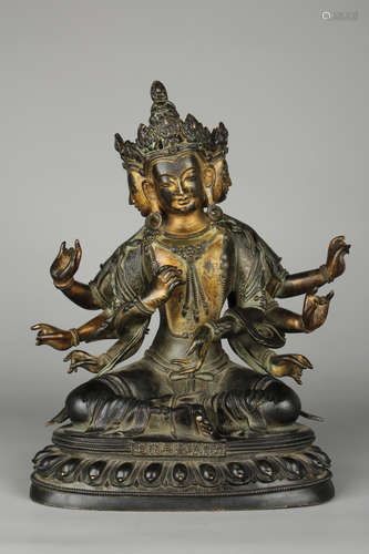 GILT BRONZE CAST 'EIGHT-ARM BODHISATTVA' SEATED FIGURE