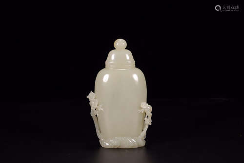 A CHINESE WHITE JADE CARVED VASE