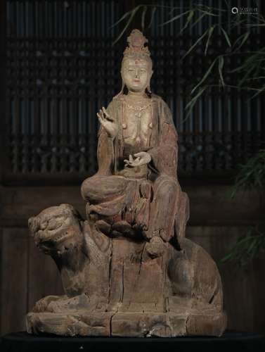 A CHINESE MANJUSRI BODHISATTVA STATUE