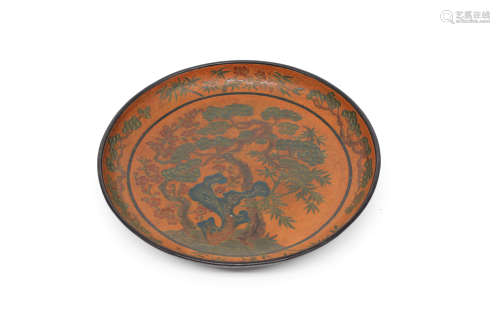 A CHINESE CARVED LACQUERWARE ROUND PLATE