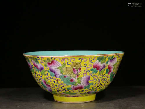 FAMILLE ROSE YELLOW GROUND 'BUTTERFLIES AND FLOWERS' BOWL