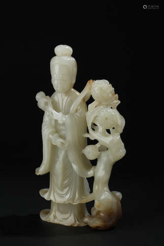 WHITE JADE CARVED 'MA GU' FIGURE