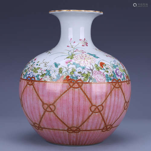 A CHINESE FAMILLE ROSE FLORAL PORCELAIN ZUN