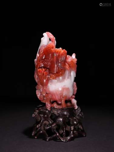 A CHINESE SOUTH RED AGATE BUDDHA'S HAND ORNAMENT