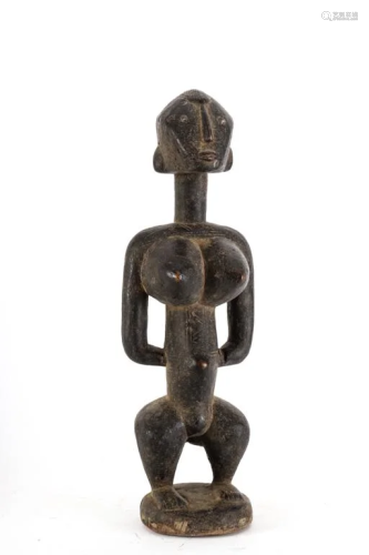 FINELY CARVED FIGURE OF A FEMALE (c.1930)