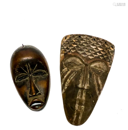 TWO CARVED AFRICAN MASKS