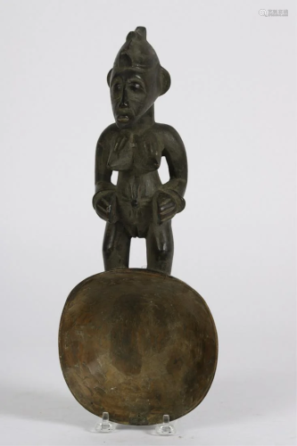 A SENUFO SPOON with a FEMALE-FORM HANDLE