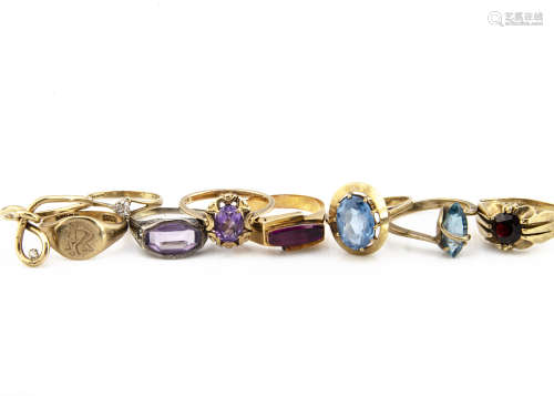 A collection of 9ct gold gem set rings, including an amethyst and diamond Art Deco example, ring