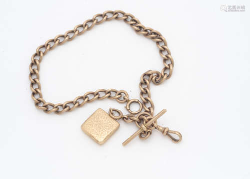 A late Victorian 9ct gold double Albert watch chain, twist oval links, hallmarked, with T bar and