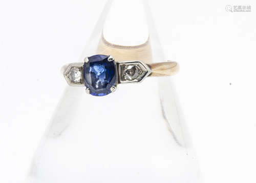 An Art Deco sapphire and diamond three stone dress ring, the oval mixed cut claw set sapphire