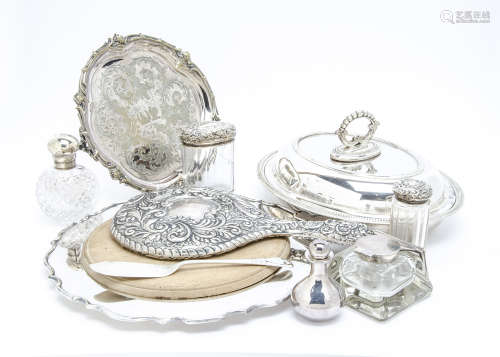 A small group of silver and silver plate, including a glass and silver mounted inkwell with