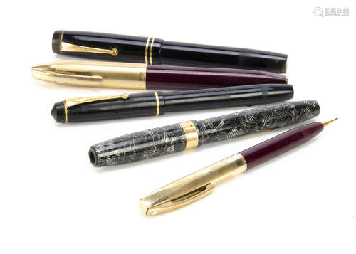 Two vintage Conway-Stewart fountain pens, together with a Sheaffer fountain pen and pencil set and a