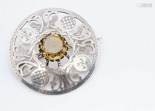 An Irish Celtic George V silver and citrine plaid brooch, dated Dublin 1912, makers JC & S, 7cm