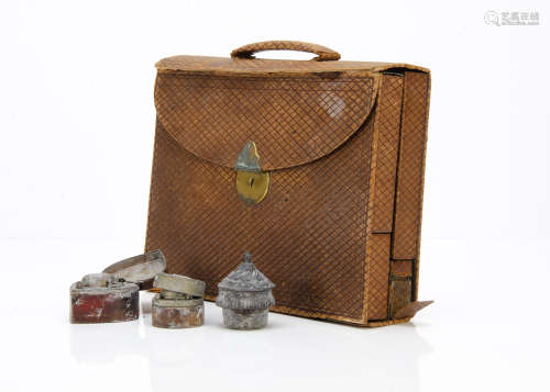 A Victorian travel writing set, brown faux leather folding out to r***al fitted compartments and