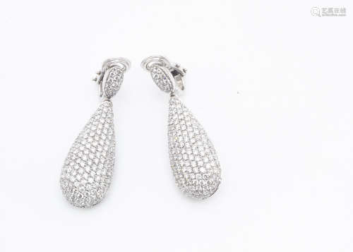 A pair of 18ct white gold continental diamond **** earrings, marked Cion Cappa, the diamond