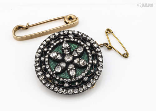 A 19th Century diamond and enamel target brooch, the rose cut diamonds in silver setting against a