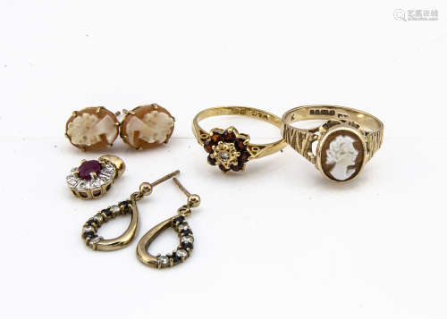 A 9ct gold cameo ring, ring size O, a pair of matched earrings, a garnet and diamond dress ring,