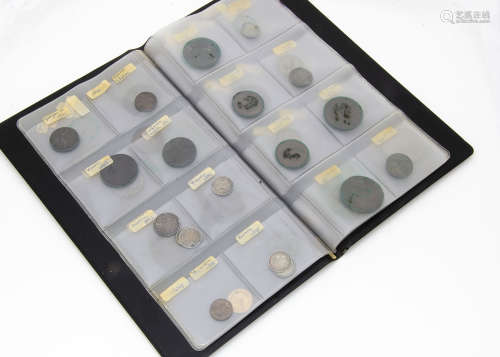 A small schoolboy collection of coins, including a George III 1808 third guinea, with drill hole,