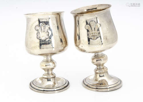 A pair of damaged 1980s silver commemorative goblets, celebrating the wedding of Charles & Diana,