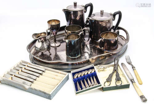 A collection of silver plate and other ****s, including an oval tray, four piece tea set, six silver