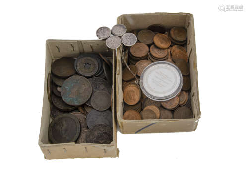 A small collection of coins, including a silver 1981 Charles & Diana commemorative medallion, and