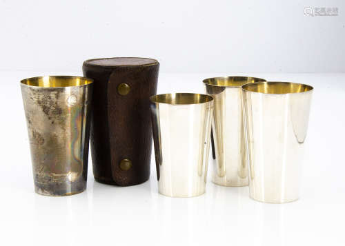 A set of 1920s silver travel or campaign beakers by HEB FEB, the stacking cups in leather case