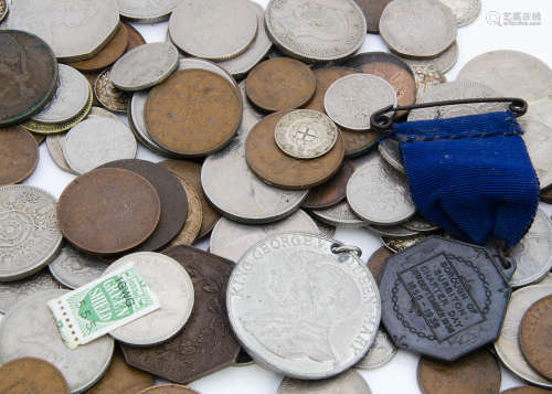 A collection of coins and stamps, 20th Century British, together with a bag of used stamps