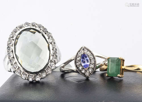 Three contemporary gold and silver gem set rings, including an emerald 9ct gold example, 1.8g,