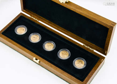 A Royal Mint five full gold sovereign George V Gold Mint Mark Set, in fitted wooden box, with