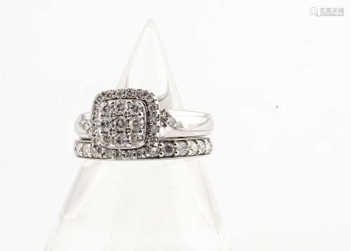 A 9ct white gold diamond set wedding and engagement ring, the tabular cluster ring with a cushion