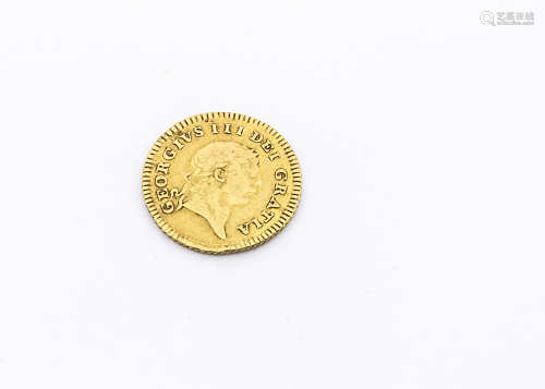 A George III gold third guinea, dated 1804, F-VF