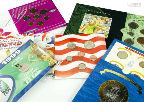 A collection of modern uncirculated coins and coin sets, most duplicated, including Queen