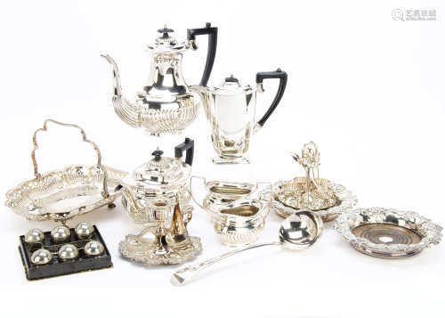 A group of silver plated ****s, including a four piece tea set, chamberstick, pair of bottle