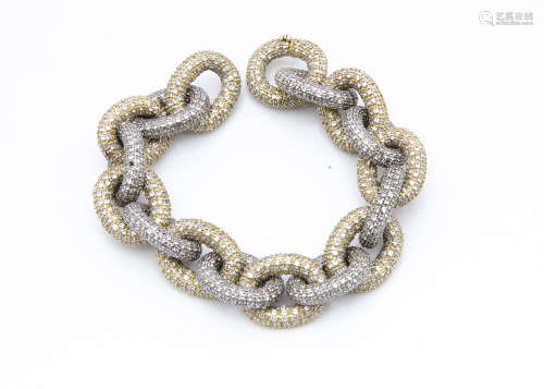 A large oval linked silver and silver gilt paste encrusted chain bracelet, with oval linked clasp of
