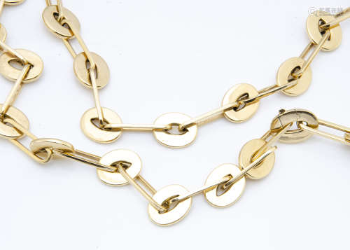 A contemporary continental 18ct gold dress necklace, the oval links alternating between flattened