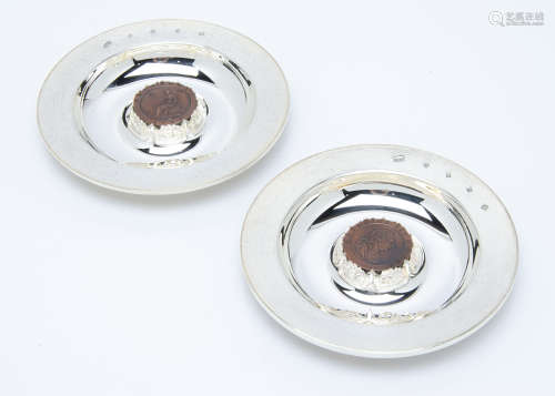A pair of Royal Mint limited edition Britannia Silver Dishes, the Armada style dishes each having