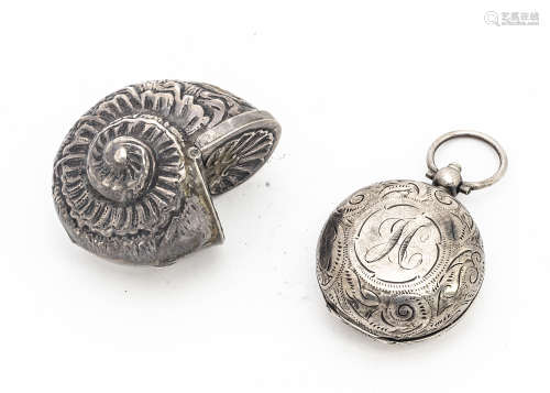 Two silver collectables, including a sovereign case and an ammonite shell shaped small case (2)