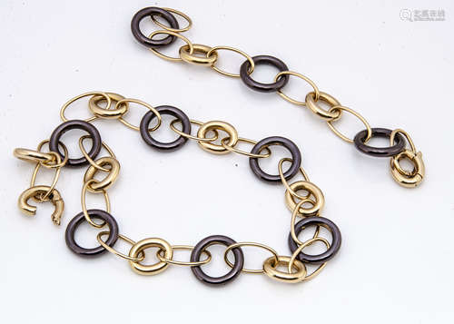 An 18ct two gold coloured oval necklace and bracelet, of similar design by Mattioli of Italy,