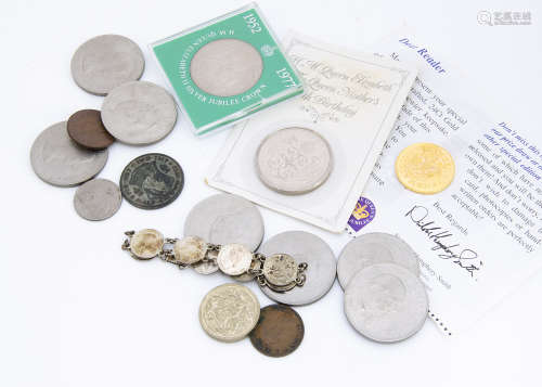 A small collection of coins, including a worn George III and Victorian crown, s***ral modern