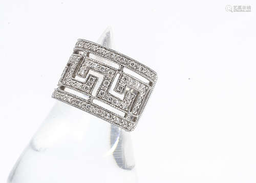 An 18ct white gold diamond set Greek key style dress ring, ring size M, total diamond weight 0.64ct,