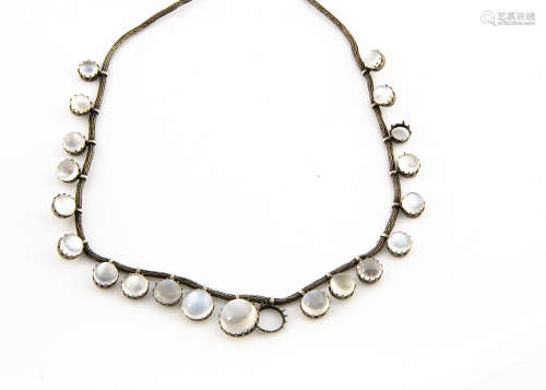 A white metal and moonstone fringe necklace, the cabochon moonstones on a fine linked chain with S