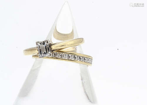 An 18ct gold fancy baguette cut diamond solitaire, and two colour 18ct gold wedding band, diamond