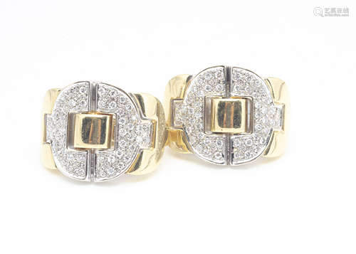 A pair of continental 18ct two coloured gold buckle shaped ear clips, the brilliant cut diamonds