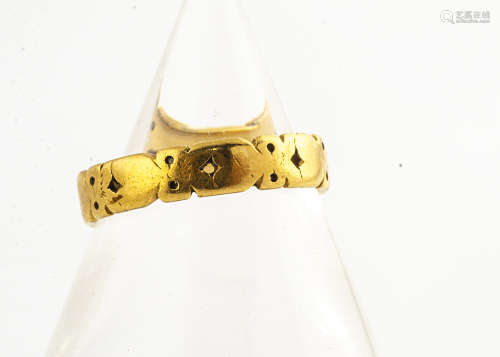 A 22ct gold shaped and pierced wedding band, L 1/2, 3.6g