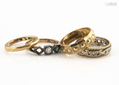 Four gold rings, including an 18ct gold diamond three stone ring, one setting vacant, ring size L,