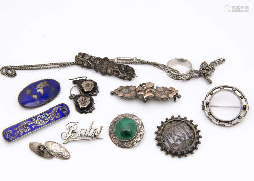 A quantity of silver Victorian and later brooches, including a pair of aesthetic earrings, a gold