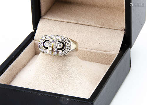 A Bvlgari 18ct gold diamond buckle ring, the brilliant cuts in claw settings, ring size I, diamond