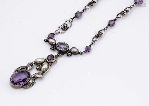 A contemporary amethyst and blister pearl Arts and Crafts style silver necklace and pendant, the