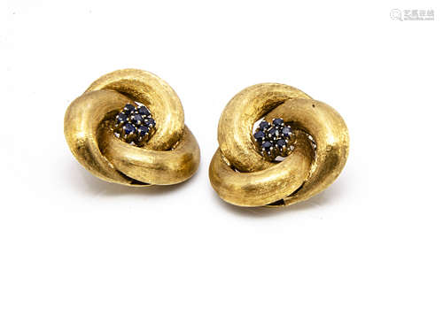 A pair of 18ct gold sapphire knot ear clips, the central sapphire cluster surrounded in a textured